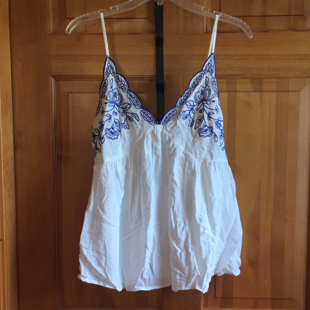 New with tag flowy white spaghetti strap top with blue embroidery, size L
